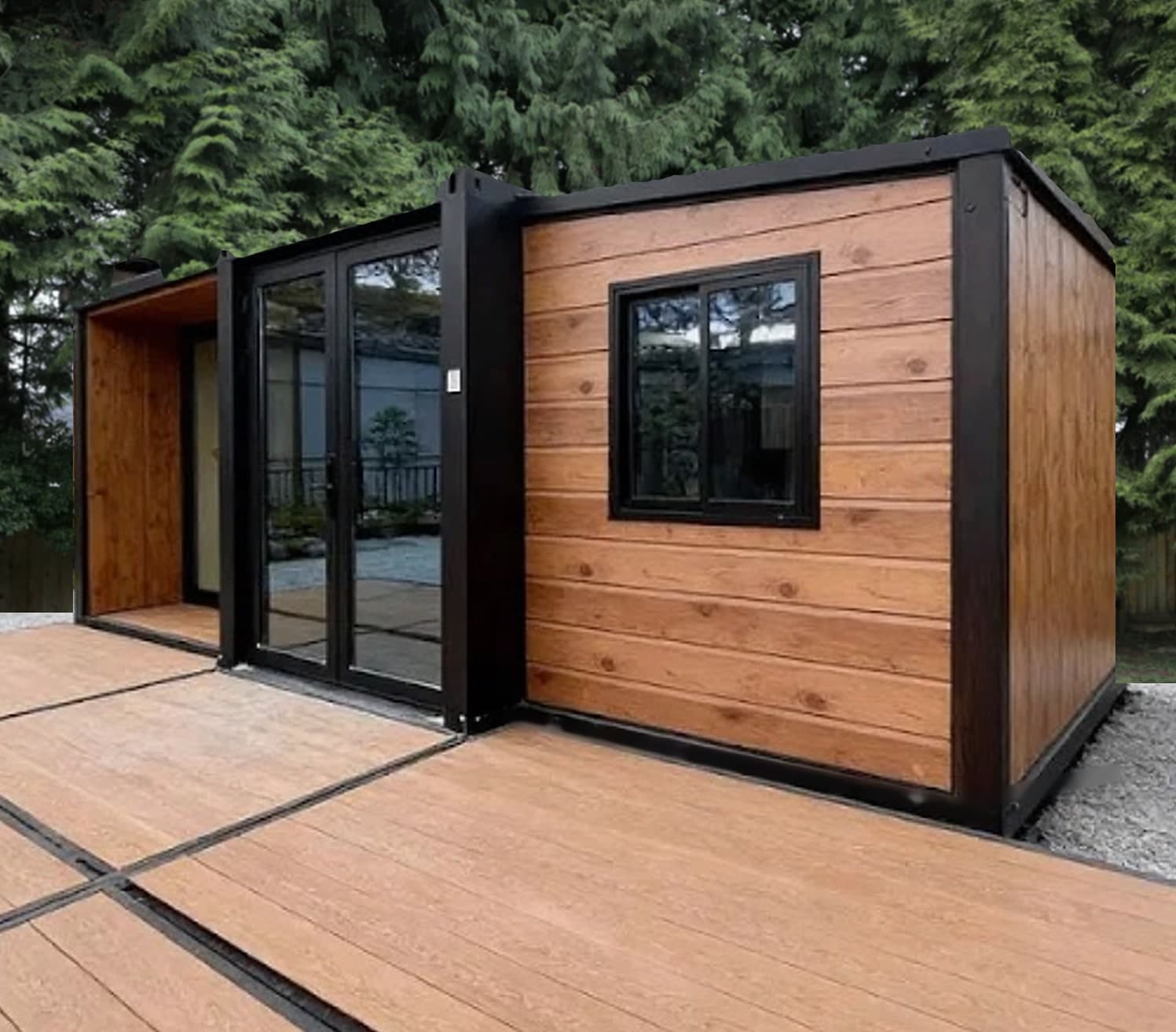 X3 Expandable with wood siding and glass entry on a deck, mountains behind